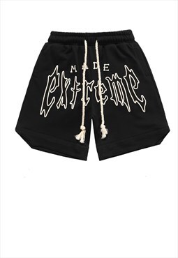 Extreme applique shorts graffiti patch pants in black