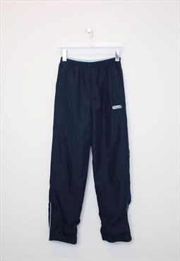 Vintage women's Ellesse joggers in navy. Best fits XS