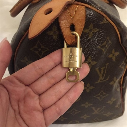 Louis Vuitton padlock with keys 