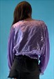 VINTAGE 1970S PURPLE TEXTURED BLOUSE WITH BALLOON SLEEVES.
