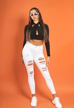 White skinny extreme distressed jeans