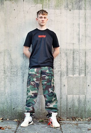 CAMO TROUSERS WITH WOVEN LABEL DETAIL