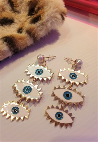 GOLD EARRINGS WITH ABSTRACT EYE DETAILS