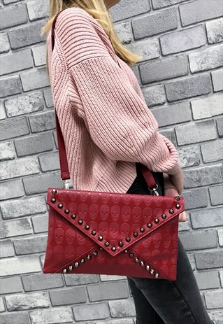 RED STUDDED SKULLS CLUTCH BAG