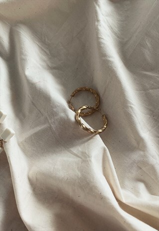 STEEL LOOP EARRINGS IN GOLD