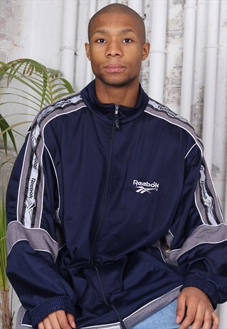 VINTAGE REEBOK TAPE LOGO TRACK JACKET NAVY BLUE