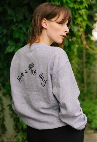 EMBROIDERED HAVE A NICE DAY SLOGAN DAISY SWEATER