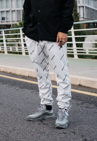 HANDMADE JOGGER TROUSERS IN BEIGE WITH YOUR EGO SUCKS PRINT
