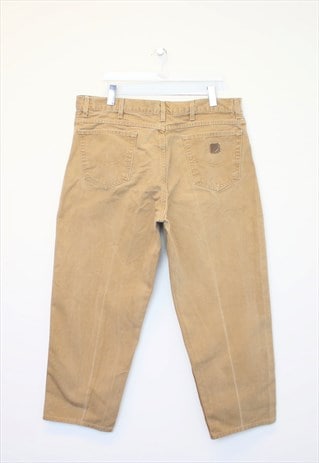 Vintage Carhartt carpenter trousers in sand. Fits W40 L29