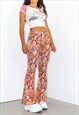 00S STRETCHY SNAKE PRINTED FLARE TROUSERS
