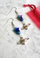 COSMIC PLANET IRIDESCENT STAR X FACET CRYSTAL EARRINGS