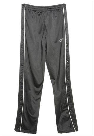 BEYOND RETRO VINTAGE BLACK REEBOK TRACK PANTS - W26