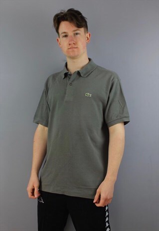 VINTAGE LACOSTE POLO SHIRT IN GREY WITH EMBROIDERED LOGO.
