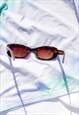 TORTOISE SHELL NARROW OVAL WEIGHTED EDGE SUNGLASSES