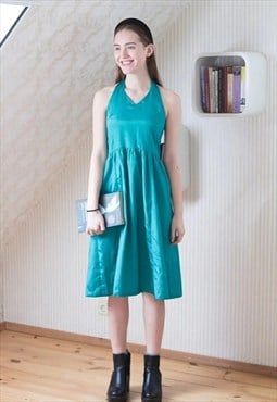 Emerald green halter neck shiny dress