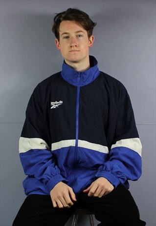 VINTAGE REEBOK POLYESTER WINDBREAKER JACKET IN BLUE WITH ZIP