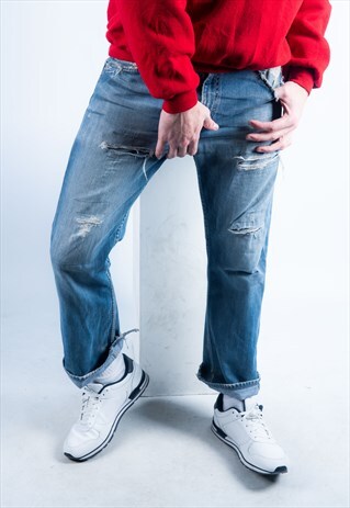 VINTAGE LEVI'S 507 JEANS IN BLUE DENIM WITH RIPS