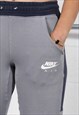 VINTAGE NIKE JOGGERS IN GREY WITH SPELL OUT LOGO XS