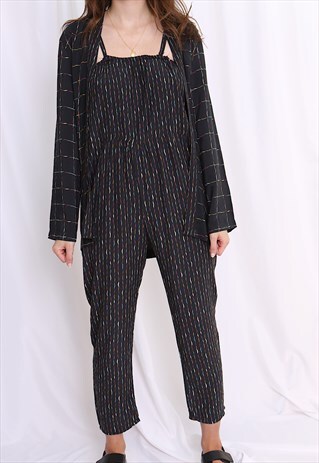 black jumpsuit and jacket