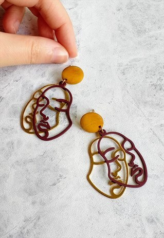 TWO FACED ABSTRACT FACE EARRINGS