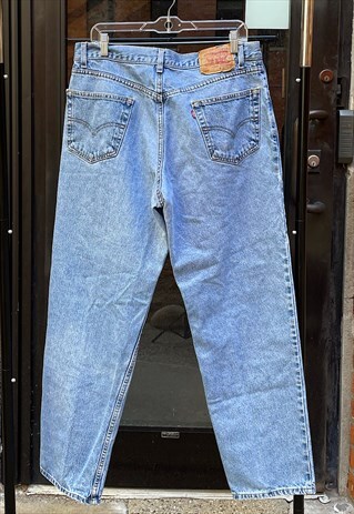 VINTAGE 90S LEVI'S 550 LIGHT WASH MOM JEANS (34)