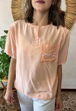 1970's vintage peach blouse with embroidered knot detail