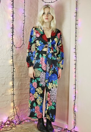 TROUSERS & WRAP TOP CO-ORDINATES IN FLOWER PRINT ON BLACK