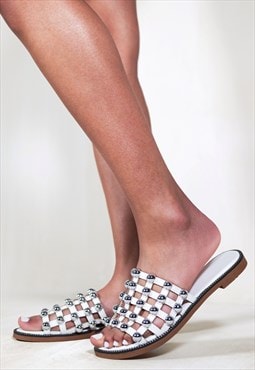 Kelly studded slider with caged studded detailing in white