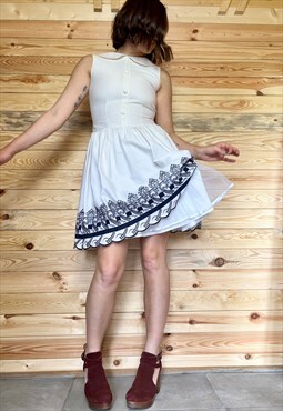 1980's vintage white mod mini dress with floral embroidery