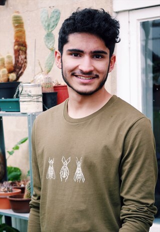ORGANIC LONG SLEEVE TOP IN OLIVE WITH UNEXPECTED POLLINATORS