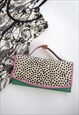 NEPHELE SUSTAINABLE LEATHER MINT PINK SPOT CLUTCH PURSE