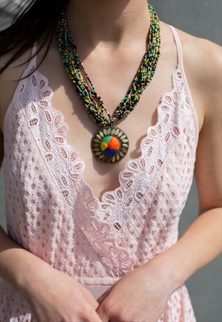 MULTICOLOUR BEADED NECKLACE WITH MOSAIC SUN BRASS PENDANT