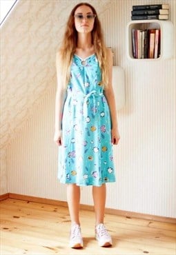 Light blue sleeveless belted dress