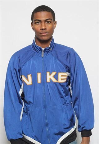VINTAGE NIKE SPELL OUT TRACK JACKET BLUE