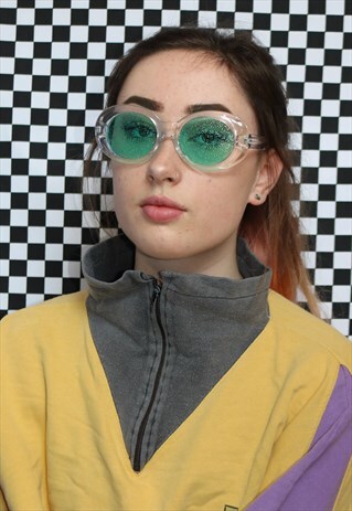 DREAMING OVAL SUNGLASSES WITH GLITTER TINTED LENSES IN GREEN