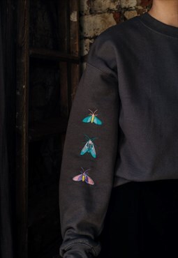 embroidered trio of moths sleeve charcoal grey sweater