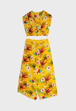 Yellow floral v-neck sleeveless blouse and flared pant set 