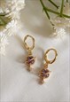 ORION PURPLE PLANET AND STAR HUGGIE HOOP EARRINGS