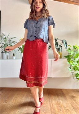 1970's vintage red midi skirt with gold and navy print