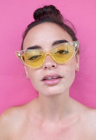 YELLOW LENSED GLASSES
