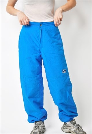 Retro 90s ski pants in blue colour Vintage sports windbrear