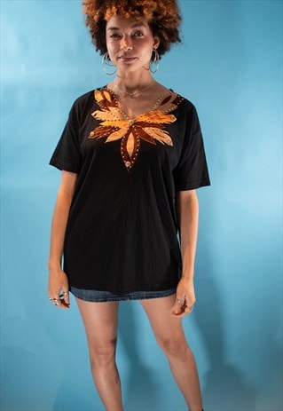 Vintage Y2K Size XL Applique T-Shirt in Black and Orange.