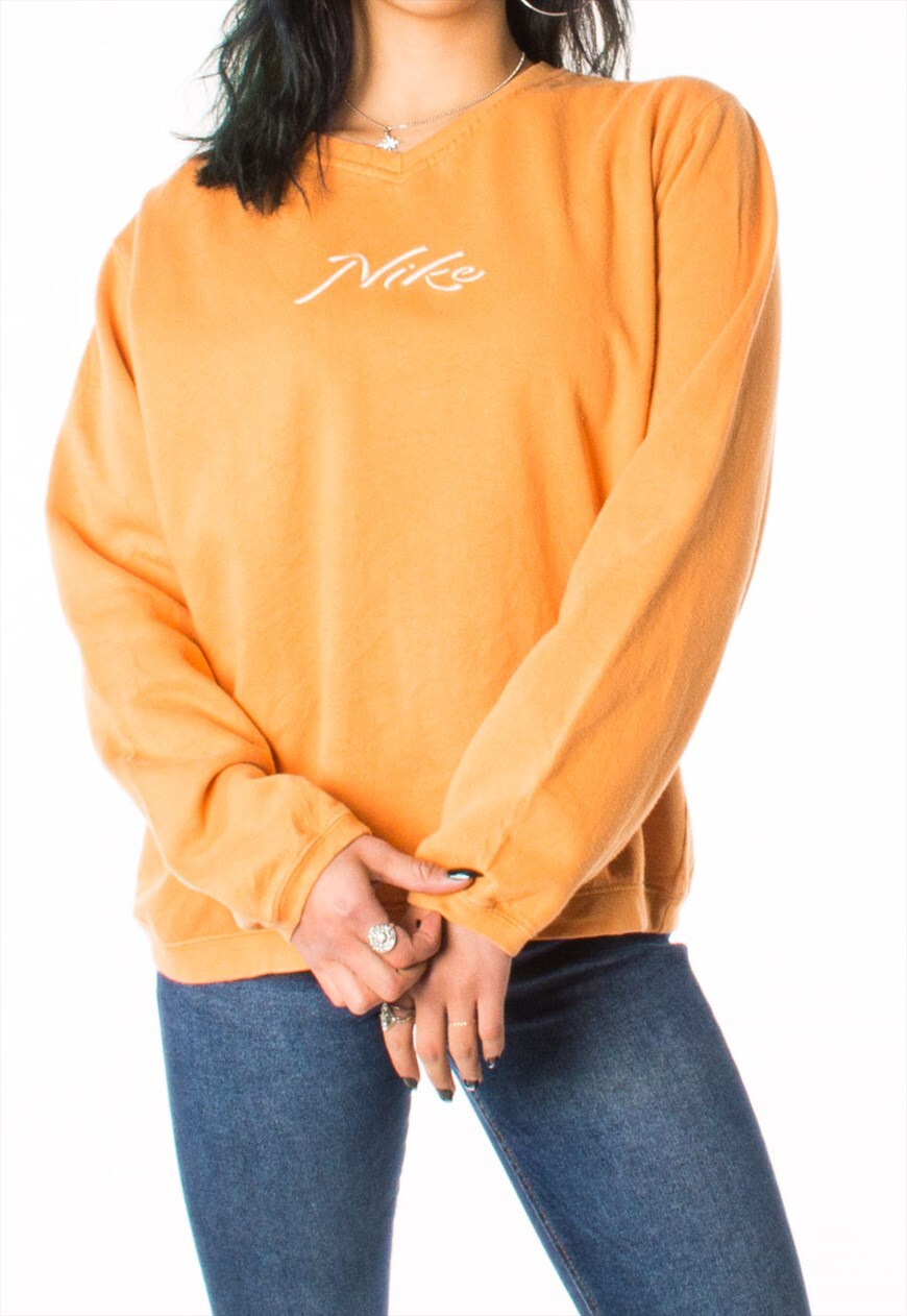 orange nike hoodie with japanese writing