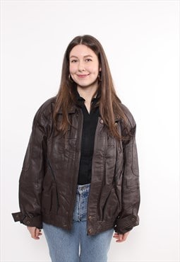 90s brown leather bomber jacket, vintage woman motorcycle 