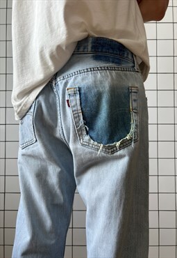 Vintage LEVIS 501 Jeans Distressed Denim 90s Wash Blue