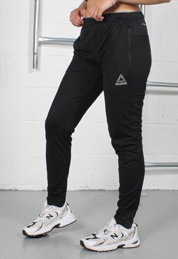 Vintage Reebok Joggers in Black with Spell Out Logo Small
