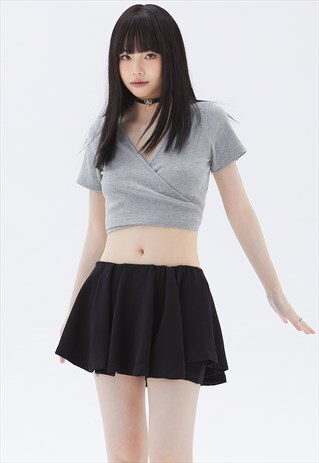 PLEATED MINI SKIRT IN BLACK