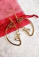 ABSTRACT FACE EARRINGS ROSE GOLD-TONE