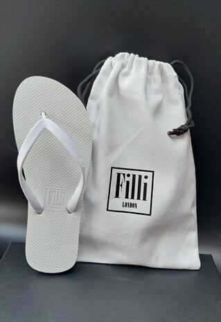 NAKED WHITE FLIP FLOPS