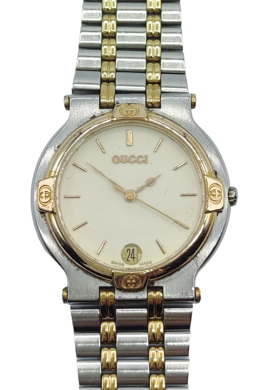 Gucci watch best sale silver and gold